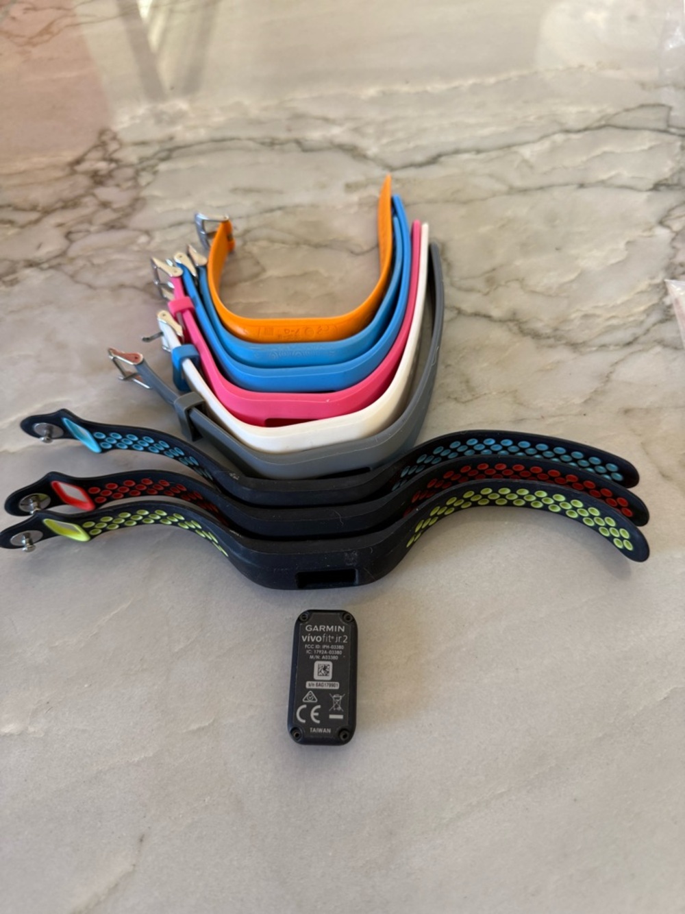 Garmin Vivofit jr.2 with 8 wristbands. Fitness/activity tracker.